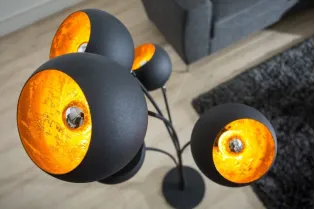 Lampadaire design en métal coloris or noir 170cm