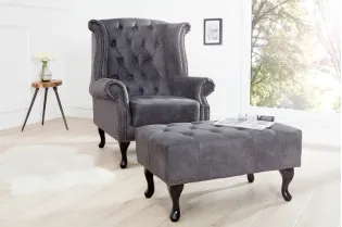 Fauteuil design Chesterfield coloris gris capitonné