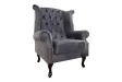 Fauteuil design Chesterfield coloris gris capitonné