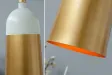 Lampe suspension design en métal de couleur dorée et blanche