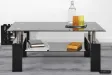 Table basse design coloris noir avec plateau en verre