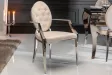 Chaise design baroque de salle à manger en velours coloris beige avec accoudoirs