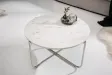 Table basse design en marbre coloris blanc avec piétement en métal argenté